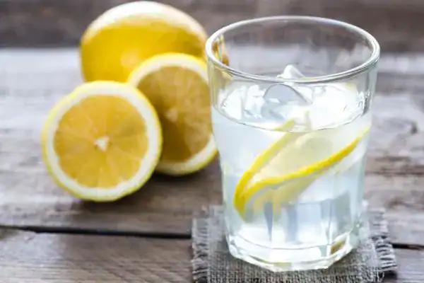 Hydration: The Secret Ingredient for a Toned Stomach and Enhanced Fitness 2 Image of lemon water to aid hydration Gravesend